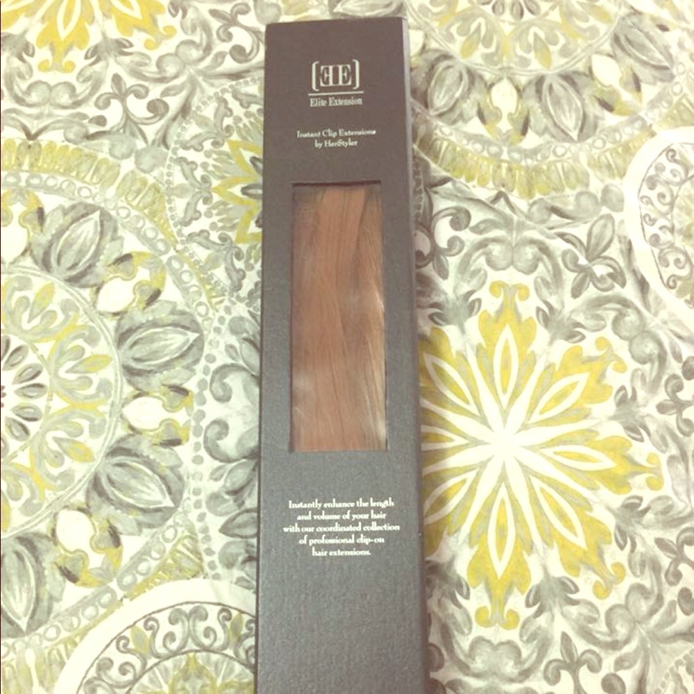 Professional clip on hair extension. Never used.
